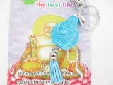 lächelndes Buddha keychain blau